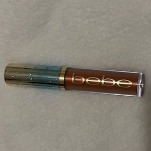 BEBE Dark Brown/Red Color Lip Gloss with Water Droplet Design on Tube. Not used.
